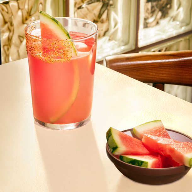 Watermelon Margarita drink with slices of watermelon