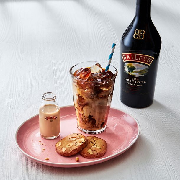 A Baileys Iced Frappe served with two cookies