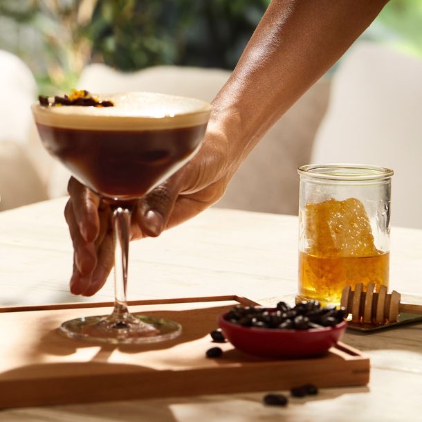 An Espresso Martini served in elegant stemware and garnished with espresso beans