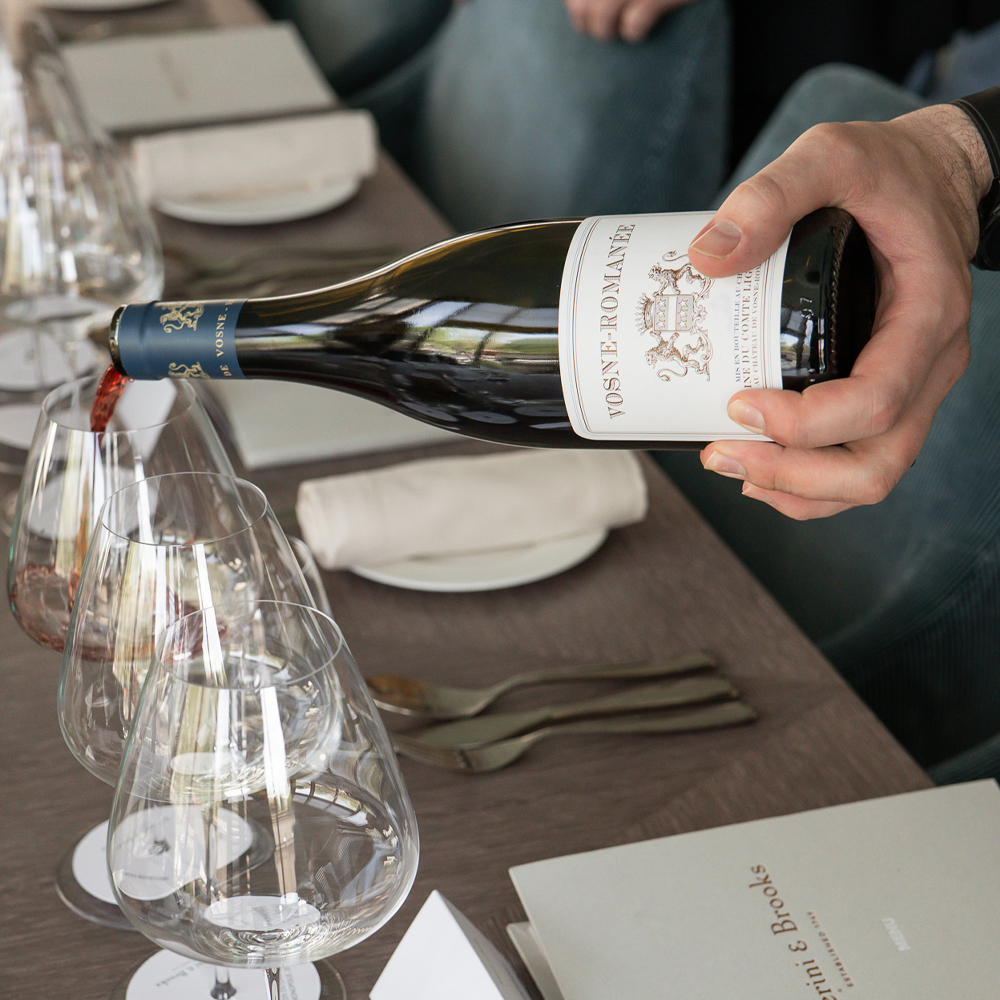 pouring bottle of wine