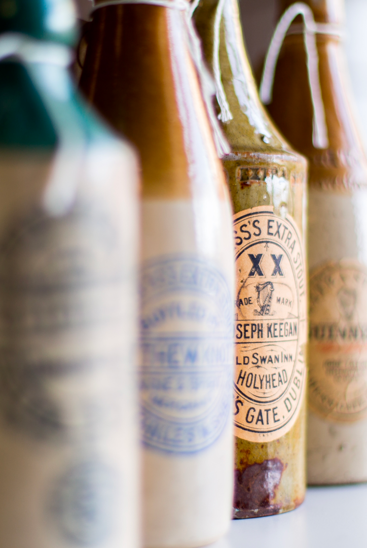 Line up of old Guinness bottles from the Guinness Archive collections.