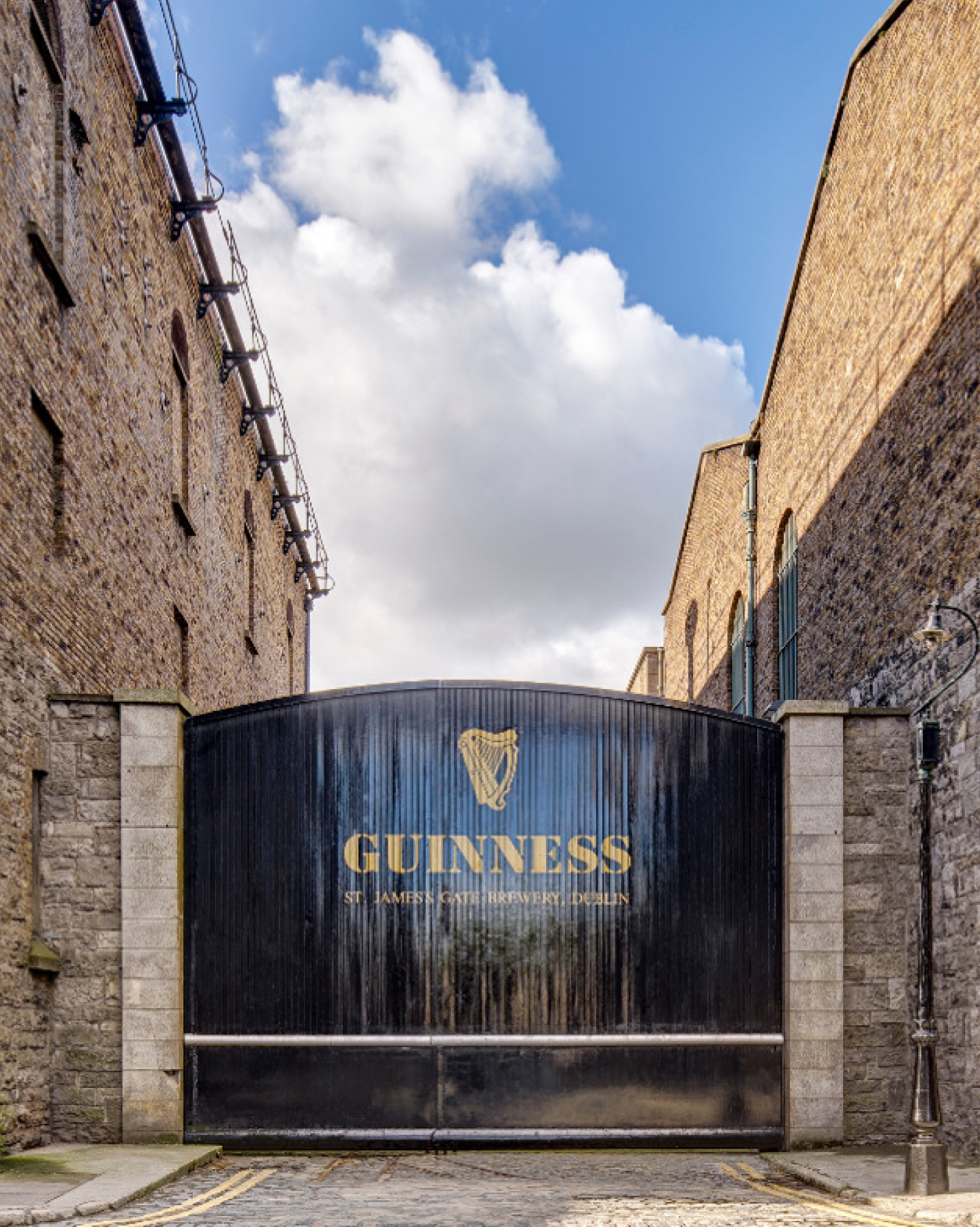 Famous image of the historical black Guinness St. James’s Gate Brewery, Dublin gate.