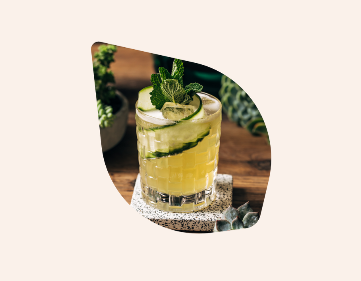 Cocktail with Cucumber Garnish