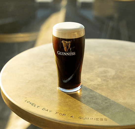 Pint of Guinness on table