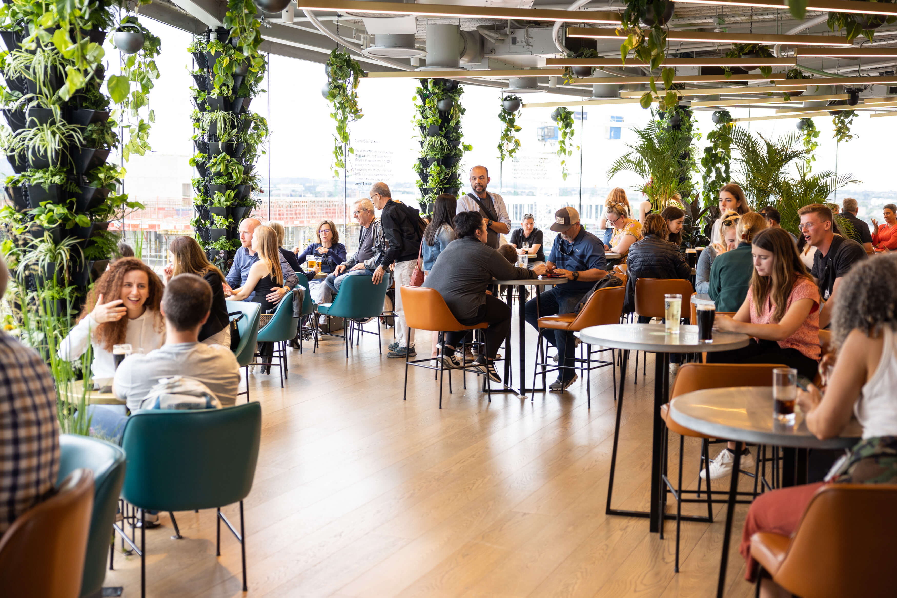 People having laughing and having a great time at the Gravity Bar during summer.