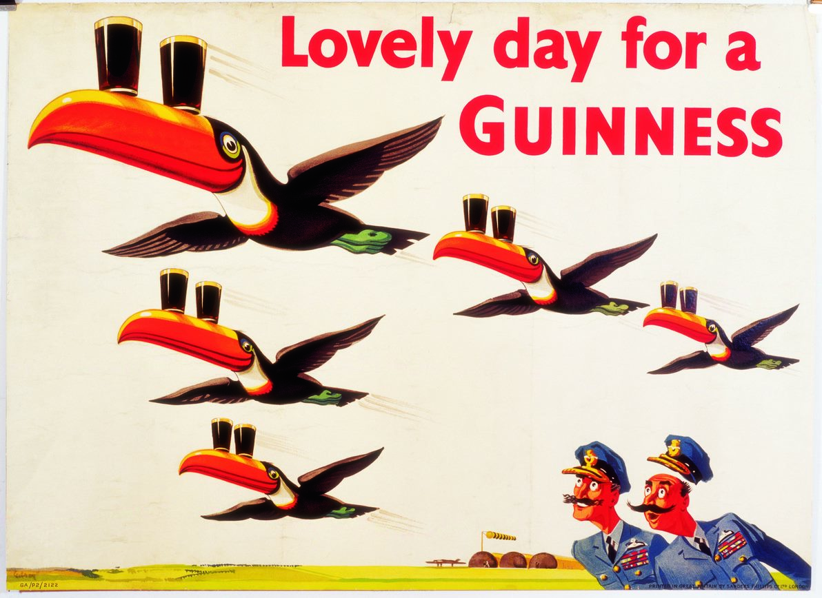 Lovely Day for a Guinness poster featuring five toucans balancing pints on their beaks. 