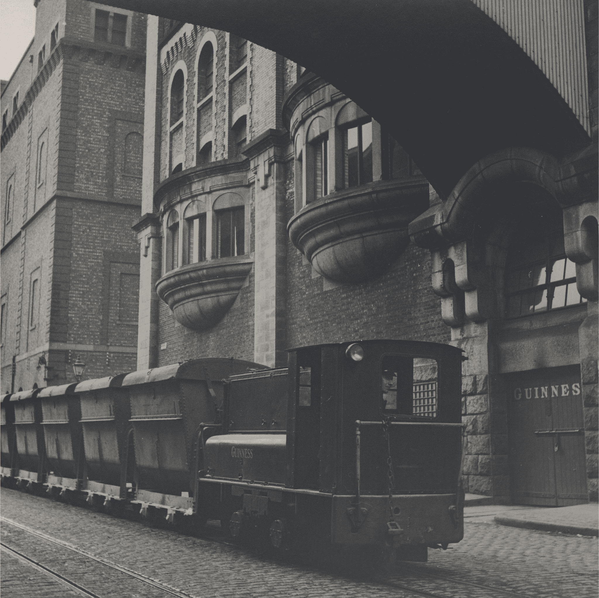 Old image of a train at the grounds of the Guinness Storehouse